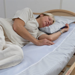 Woman Sleeping on Direct Healthcare Group WendyLett Base Sheets