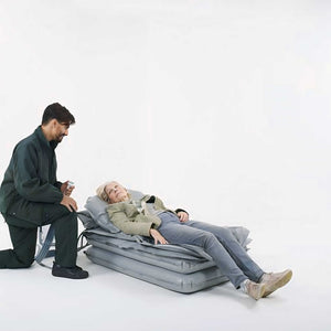 Winncare Mangar Camel Lifting Cushion With Airflo used in a lying down position