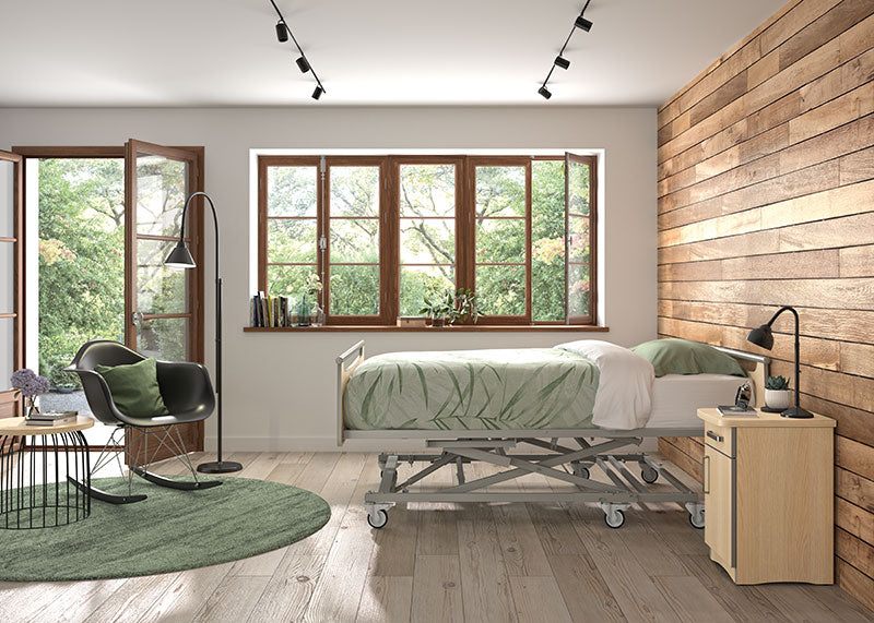 Winncare XXL X&#39;Press Profiling Bed in use