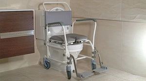 Chiltern Invadex | Aquamaster Shower & Toileting Chair Clos-O-Mat Version | Height-Adjustable and Versatile for Changing User Needs used in washroom