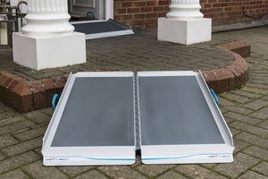 Enable Access Aerolight-Xtra Quick Deploy Lightweight Wheelchair Ramp unfolded on porch pavement 