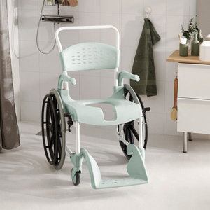 Etac | Clean Self-Propelled Shower Commode Chair Explore Ultimate Comfort and Safety Award-Winning Shower Commode Chair with Versatile Design for Shower lagoon green home use