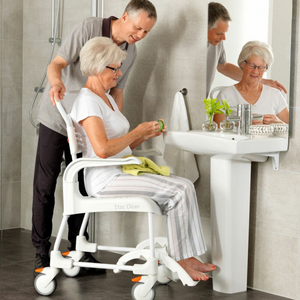 Etac | Enhance Comfort and Accessibility with the Clean Shower Commode Chair Designed for Easy Maneuverability and Optimal Hygiene man help patient 