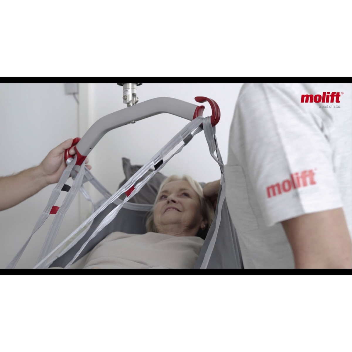 Etac | Elevate Comfort with Molift EvoSling HighBack Net Versatile Sling for Full Back Support, Head Comfort, and Easy Lifts helping patient