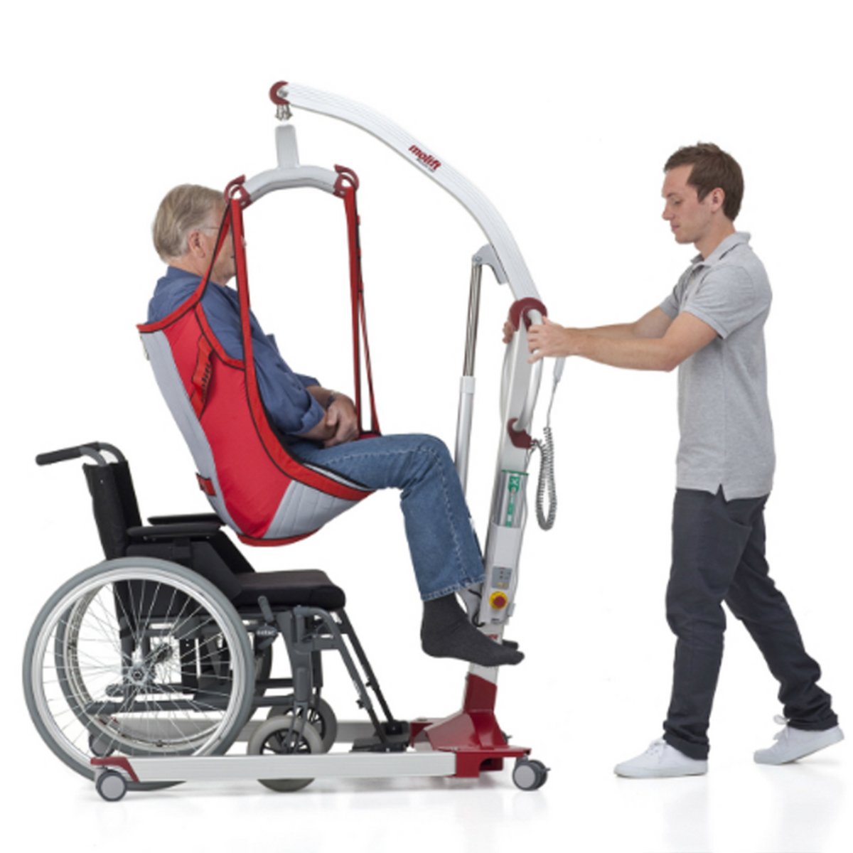 Etac | Molift Mover 180 Lightweight Aluminium Hoist with Versatile Hoisting Options and Ergonomic Design for Caregiver Comfort helping patient using sling