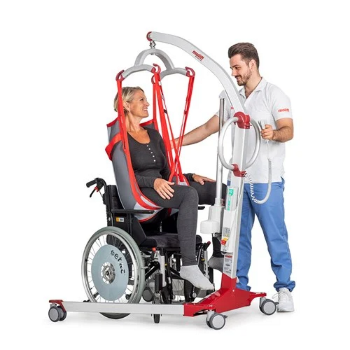Etac | Molift Mover 180 Lightweight Aluminium Hoist with Versatile Hoisting Options and Ergonomic Design for Caregiver Comfort helping woman patient