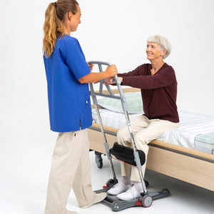 Etac | Experience Ultimate Comfort and Safety with Molift Raiser Pro Patient Lift Ergonomic Design for Caregivers, Swift Transfers, and Secure Support helping old patient woman