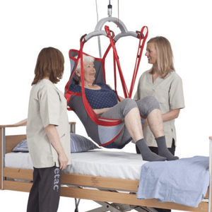 Etac | Molift RgoSling HighBack Net All-Round Sling for Head and Body Support in Homecare and Institutional Environments Versatile Design for Most Hoisting Situations women helping patient