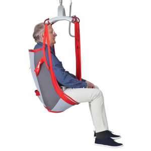 Etac | Molift RgoSling Medium Back Padded High-Quality 4-Point Sling for Users with Head Control, Ideal for Home Care and Institutions side view with patient