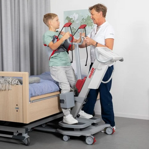 Etac | Elevate Mobility and Comfort with Molift RgoSling StandUp The Ideal Padded Sling for Active Hoisting and Versatile Seating woman helping child patient