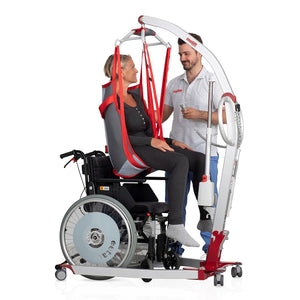 Nurse and patient in a wheelchair using the Etac | Molift Smart 150 Folding Mobile Patient Hoist