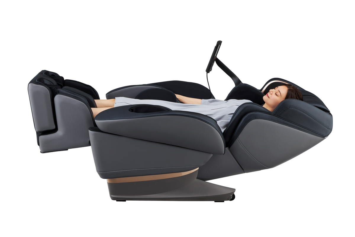 Black and grey Fujiiryoki JP-3000 Zero Gravity Massage Chair. Advanced 5D AI+ Full Body Massage Experience. Woman reclining