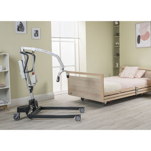 Invacare | Birdie EVO XPLUS Mobile Hoist | Redefining Comfort and Security in Patient Lifting | Patient Fall Prevention in care home room