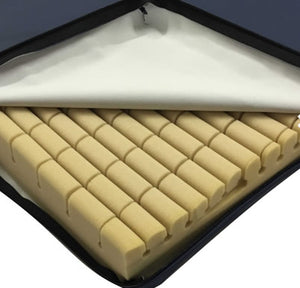 Invacare Propad Renal Mattress Overlay close up with zip open to show cover and castellated foam 