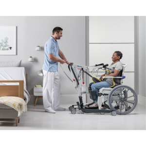 woman using the Invacare | Stand Assist ISA 140 Compact  Patient Lifter | Efficient Transfers |  Fall Prevention and Lift Aid with a nurse