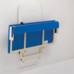 Prism Medical | Freeway Easi-Lift Changing Bench Folded agaist wall