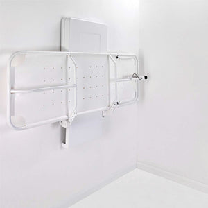 Prism Medical | Freeway Easi-Lift Electric Shower Stretcher folded against wall