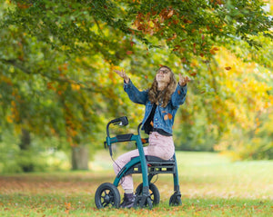 rollz motion performance all terrain combined rollator and wheelchair in use