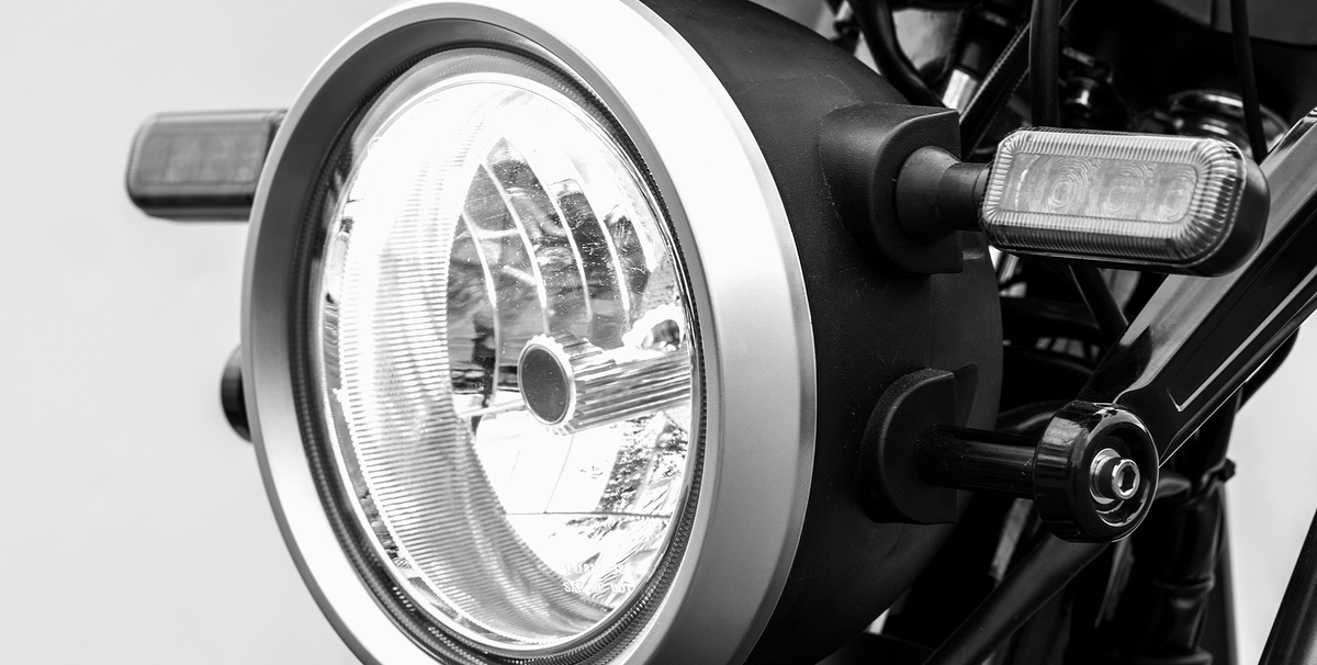 Scooterpac | Invader Off Road 16mph Electric Mobility Scooter 30 Mile range, black colour close up of head lights