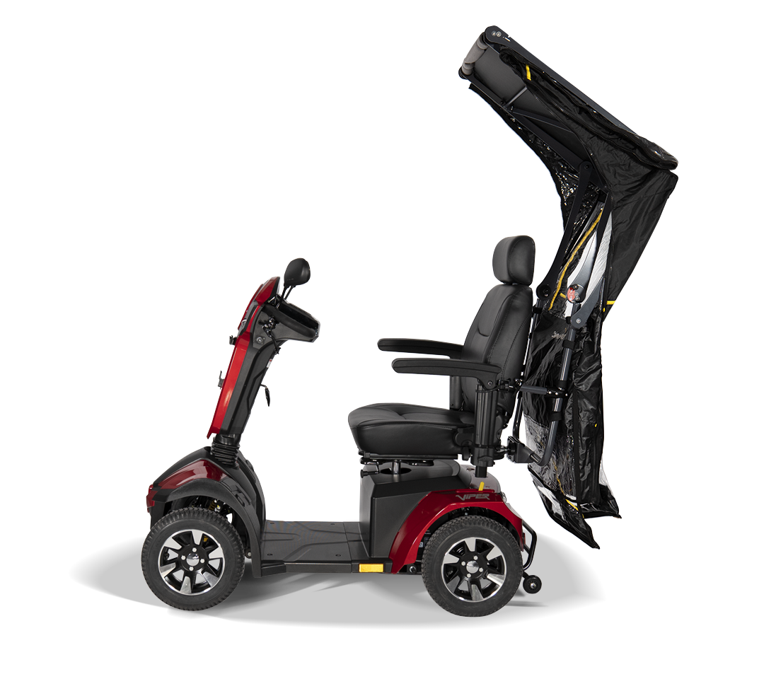 Scooterpac Universal Foldaway mobility scooter Canopy. automated Rain protection opening up over a scooter